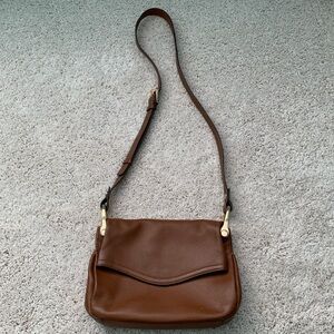 Dark tan leather fold over crossbody handbag
